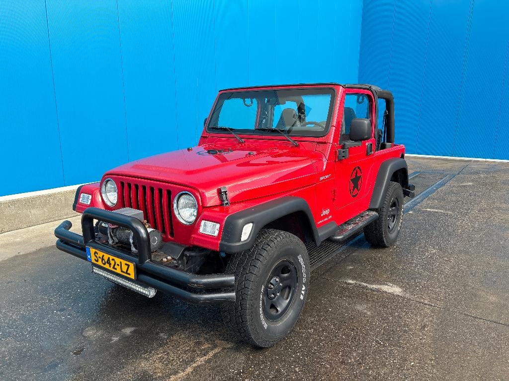 Jeep Wrangler 4.0i Soft cabrio 4x4, Auto's, Jeep, Automaat, 450 kg, Zwart, 4 stoelen