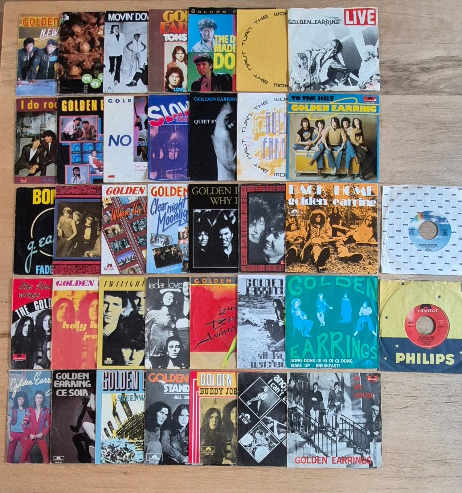 Verzameling Golden Earring singles, Cd's en Dvd's, Inclusief boekje, Gebruikt, 7 inch, Ophalen of Verzenden