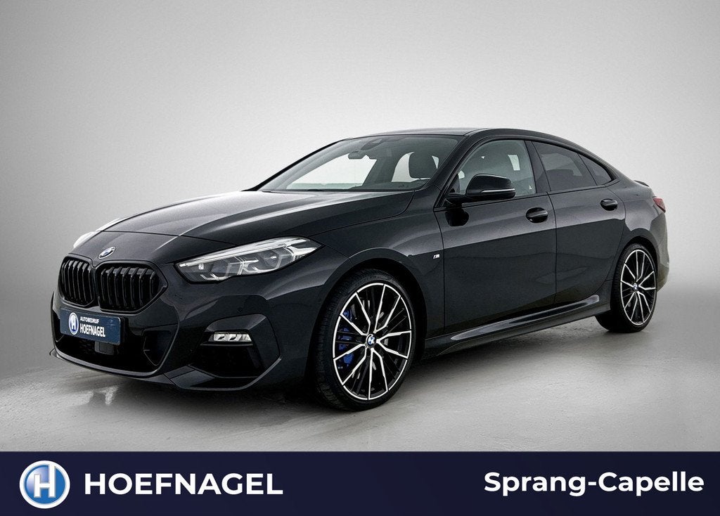 BMW 2-serie Gran Coupé 218i M Sport High Executive | Adapti, Auto's, BMW, Gebruikt, 1350 kg, Leder en Stof, Zwart
