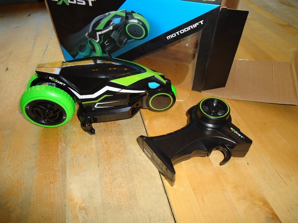 Leuk: radiografisch bestuurbare motor stuntmotor EXOST (Q), Ophalen of Verzenden, Zo goed als nieuw, Afstandsbediening