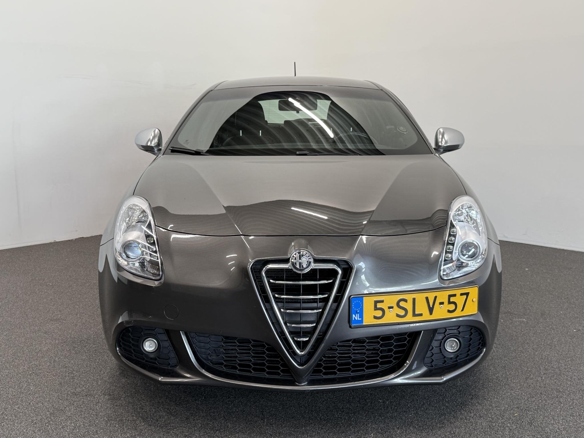 Alfa Romeo Giulietta 1.4 T Sportiva Automaat Navigatie Cruis, Auto's, Euro 5, 4 cilinders, Leder en Stof, Origineel Nederlands