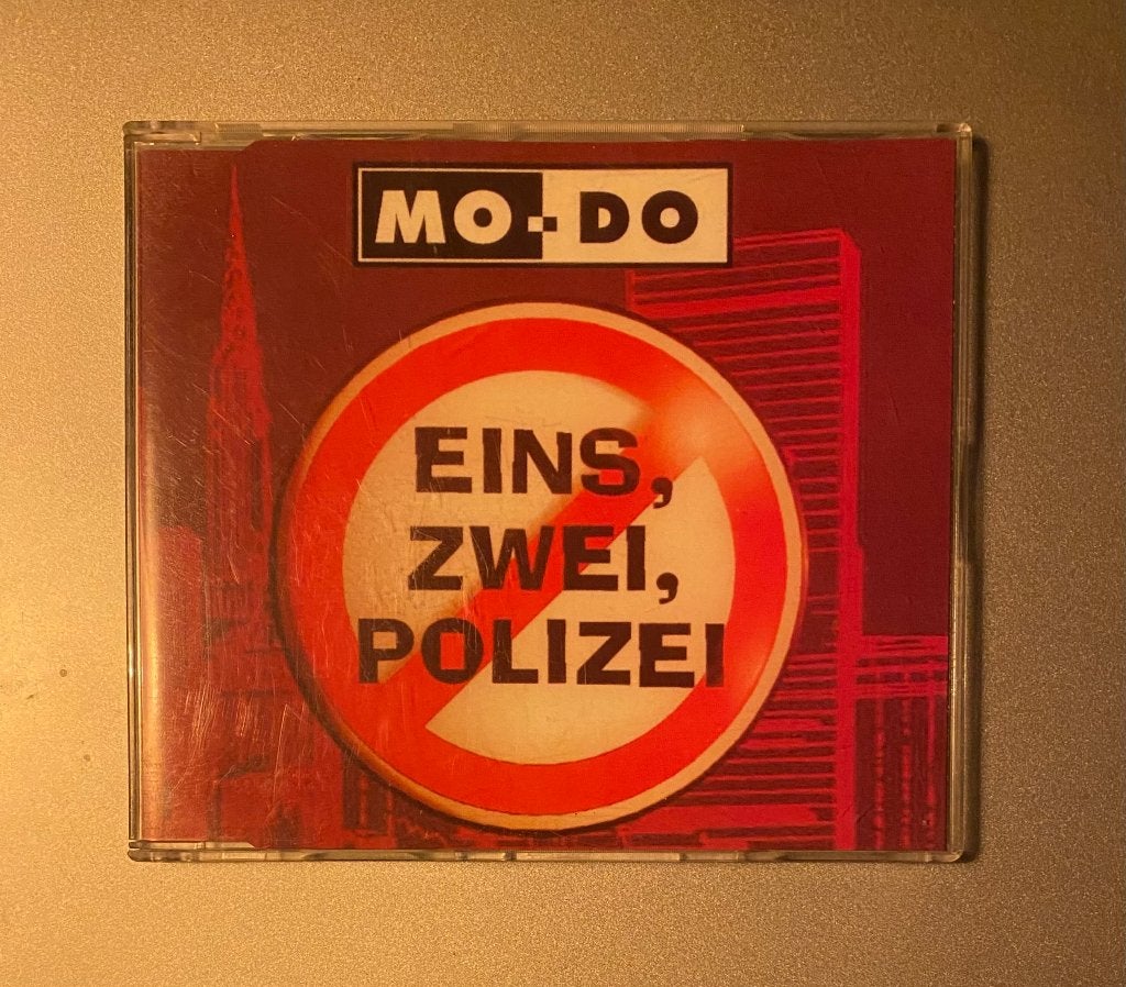 CD: Mo-Do - Eins, Zwei, Polizei 1994 Benelux - NM/NM, Pop, Ophalen of Verzenden, Zo goed als nieuw, Single