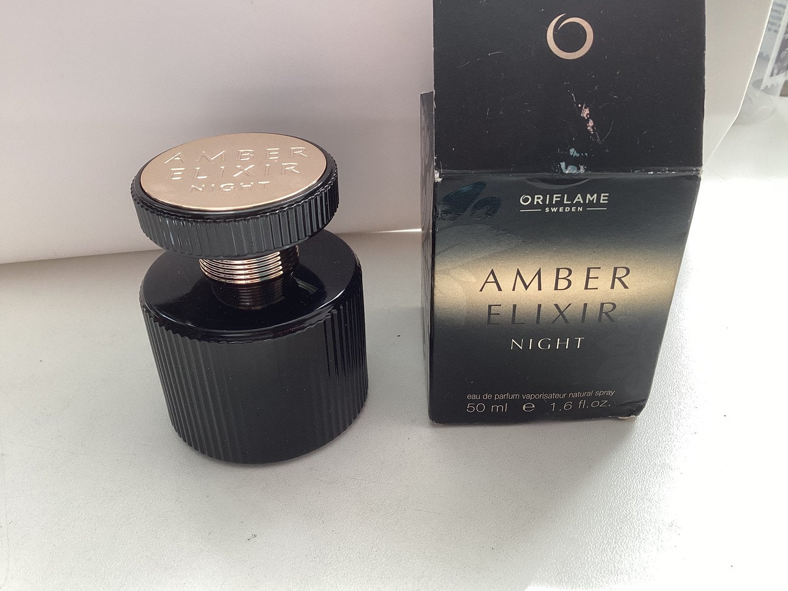 Oriflame Amber Elixir Night Eau de Parfum flesje van 50 ml, Verzamelen, Ophalen of Verzenden, Zo goed als nieuw, Parfumfles, Gevuld