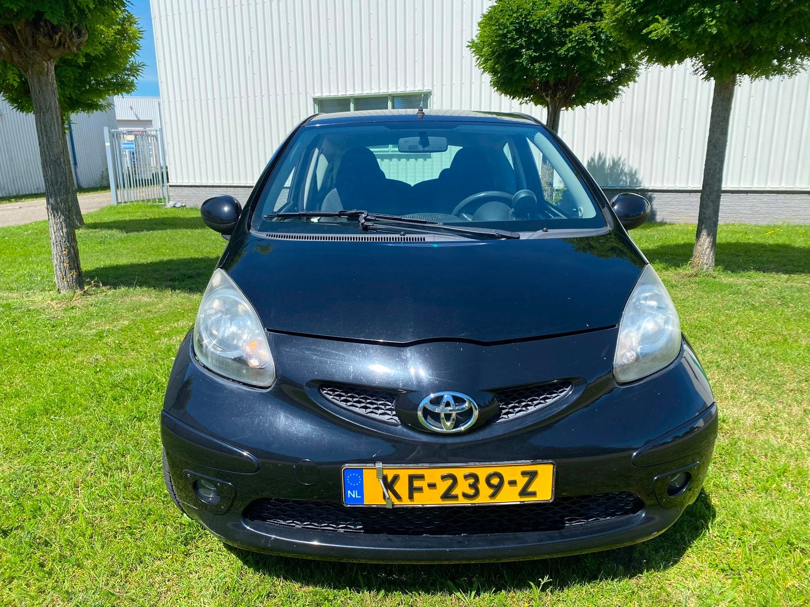 Toyota Aygo 1.0 12V Vvt-i 3DRS MMT 2006 Zwart, Auto's, Toyota, Stof, 4 stoelen, Grijs, Particulier