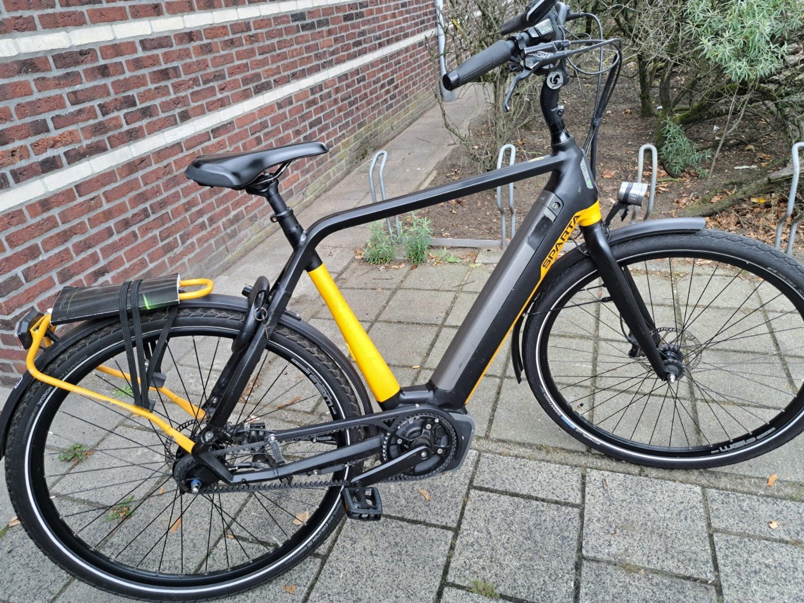 Sparta ion met  belt aandrijving Accu dient vervangen te wor, Fietsen en Brommers, 59 cm of meer, Ophalen, Gebruikt, Sparta