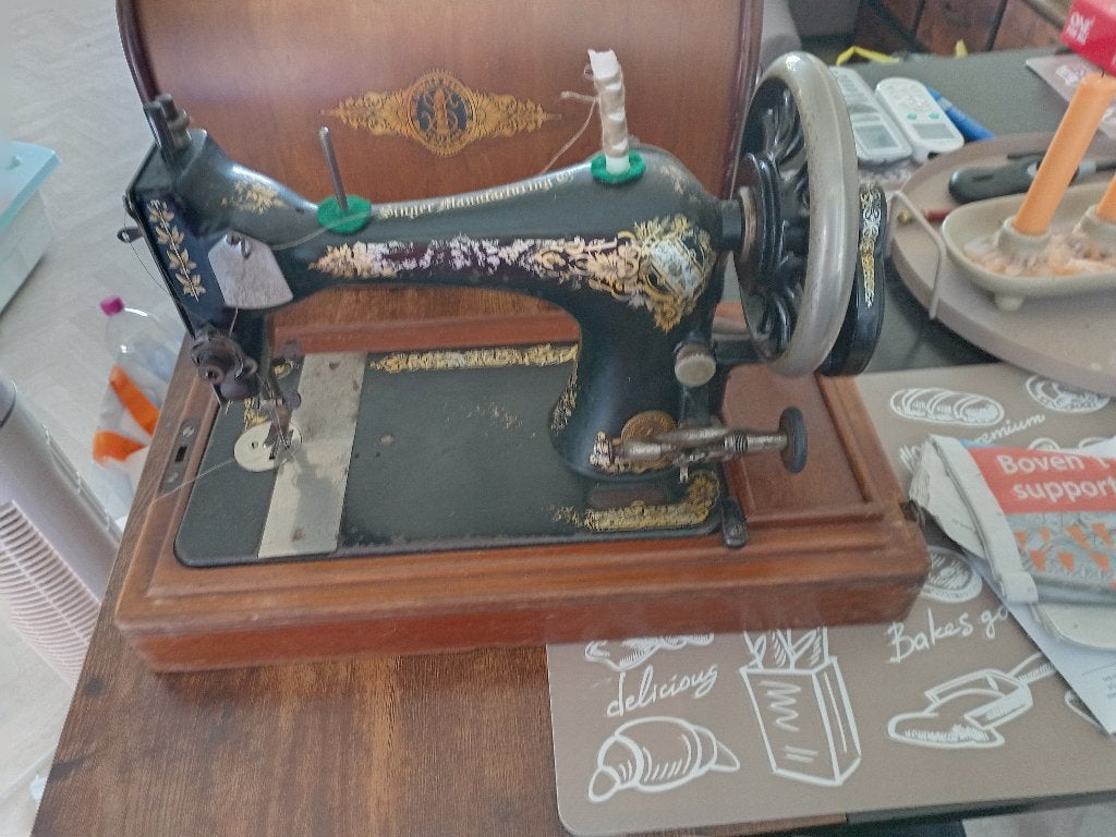 Naaimachine, Ophalen
