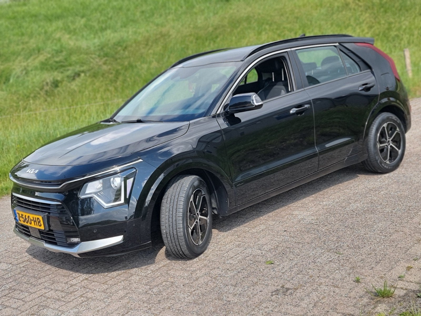 Kia Niro 1.6 GDi Hybrid 141pk Dct6 2024 Zwart, Auto's, 1374 kg, Zwart, Leder en Stof, Origineel Nederlands