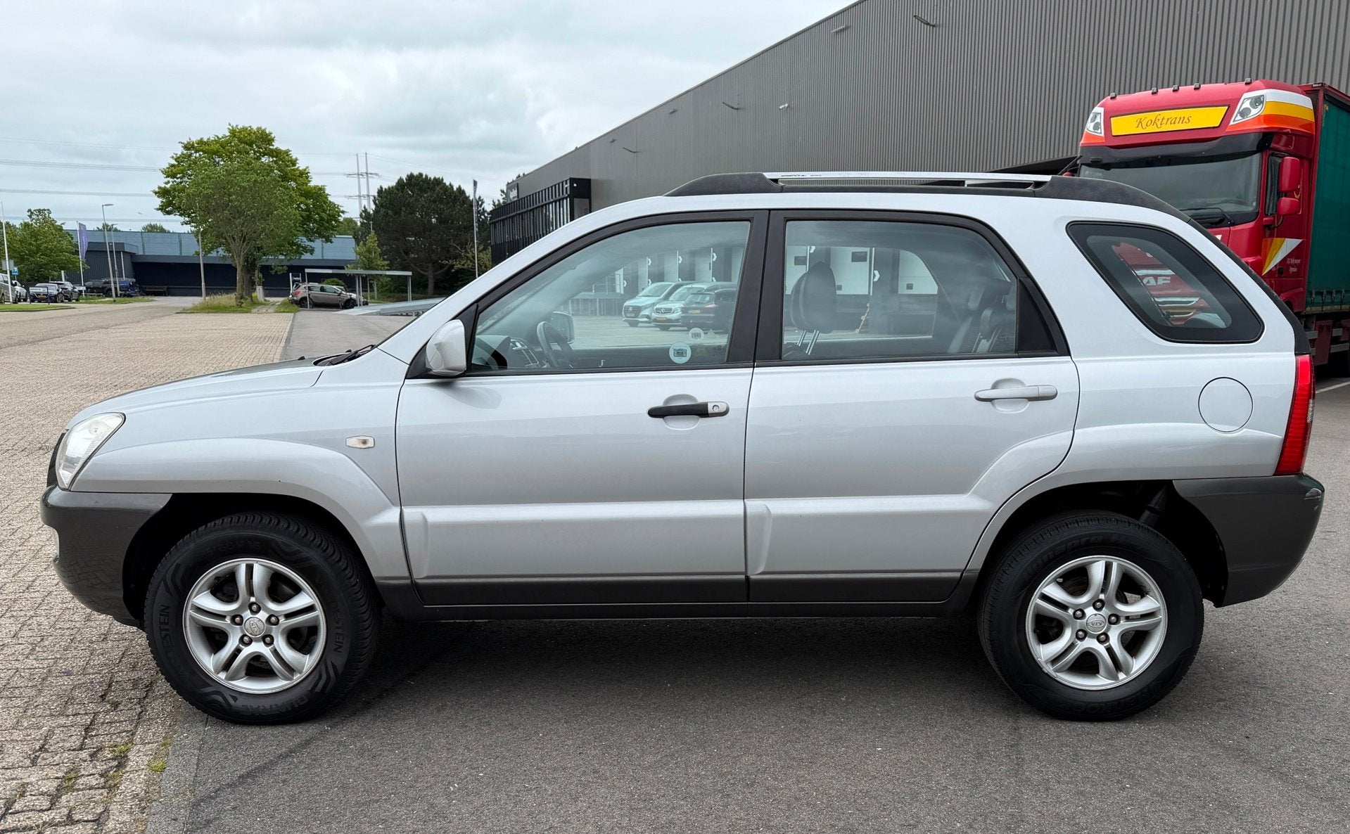Kia Sportage 2.0 CVVT X-ecutive VOLLEDIGO-H/LEDER/AIRCO/CRUI, Auto's, 1442 kg, Gebruikt, Zwart, 4 cilinders