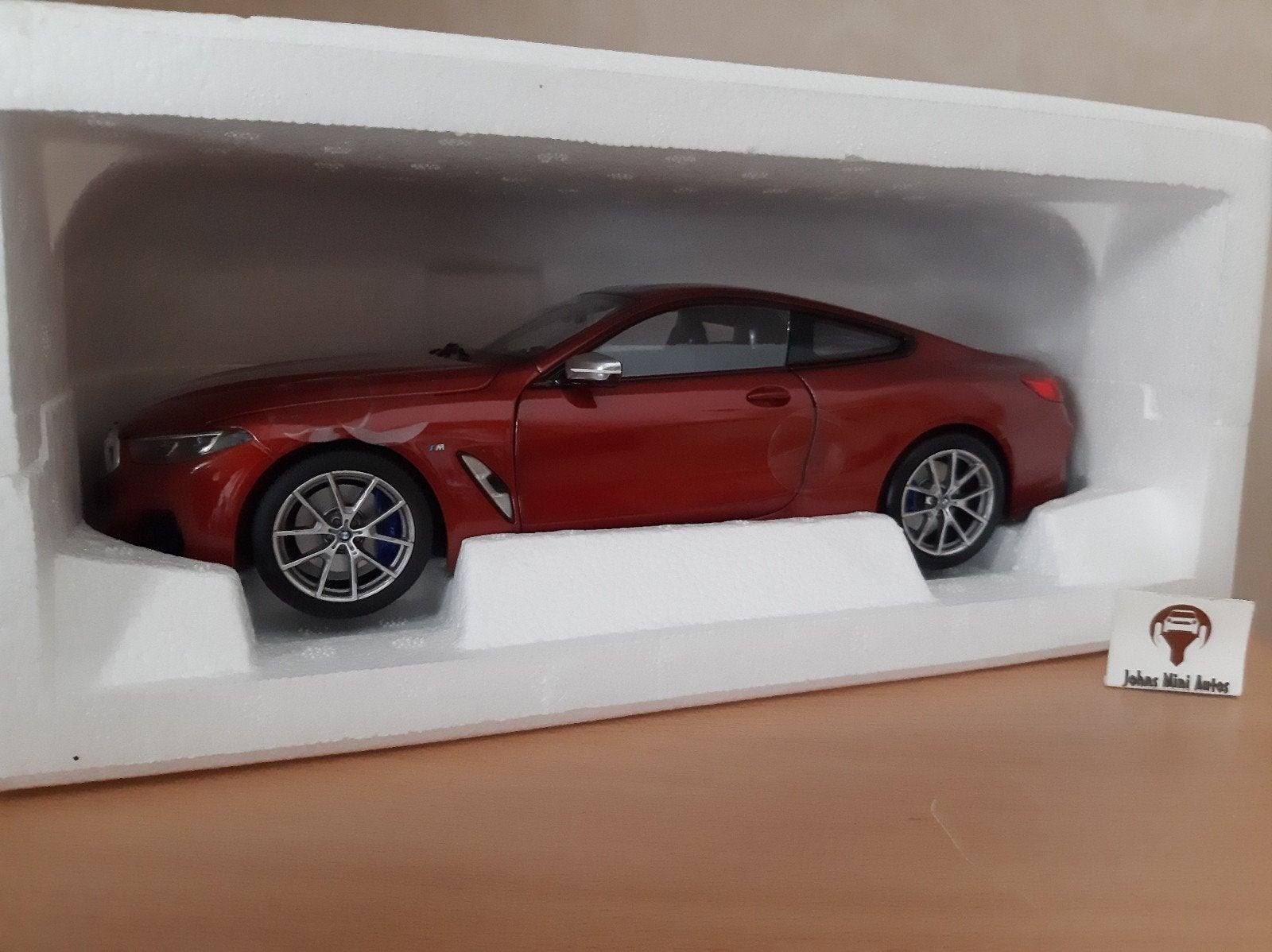 BMW M850i uit 2019 Orange Metallic van Norev HQ 1:18
