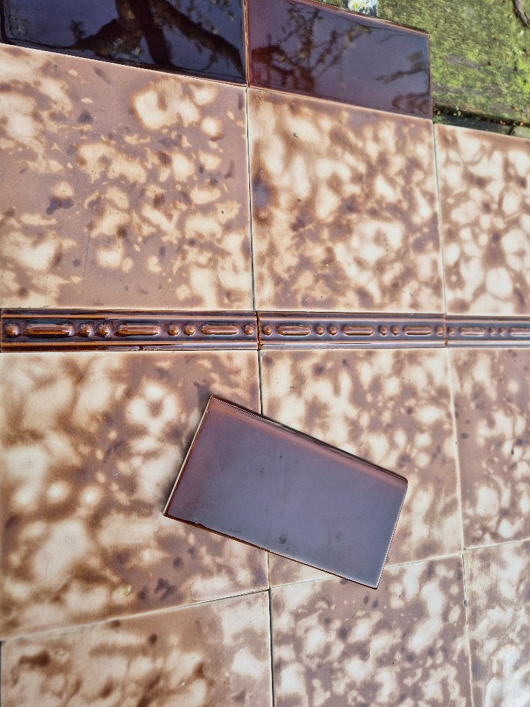 4,7m2 antieke bruin gewolkte tegels 15x15, veel randtegels