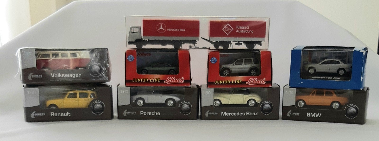 9 Schaalmodellen 1.60 in doosjes o.a. Schuco en Super 9., Ophalen of Verzenden, Auto