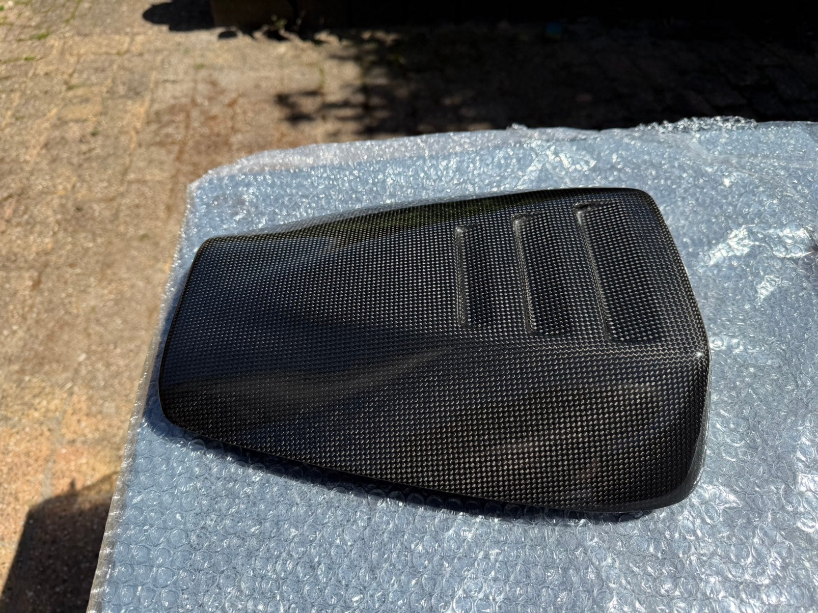 Aprilia Tuono of  Mille R OEM Carbon Seatcover, Ophalen of Verzenden