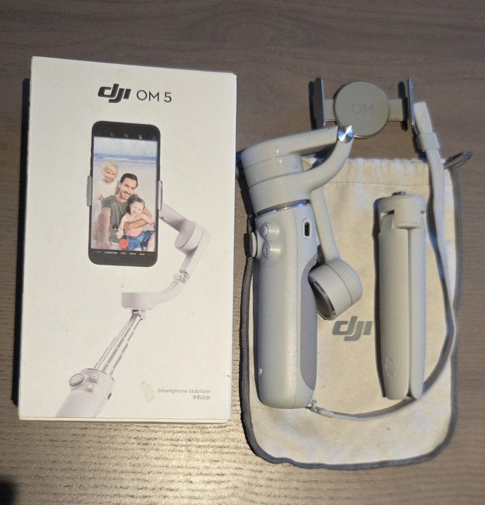 DJI OM 5 Smartphone Gimbal – Compleet & in Goede Staat, Ophalen of Verzenden, Zo goed als nieuw, Overige merken