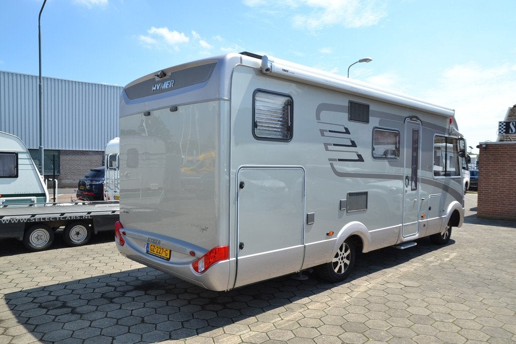Hymer Eriba B 585 Star-Light - Automaat - 2x Airco - Navi+Ca, Luifel, Ringverwarming, Afzuigkap, 7 tot 8 meter