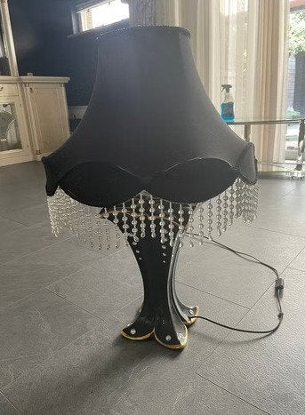 Zwarte lamp, Ophalen