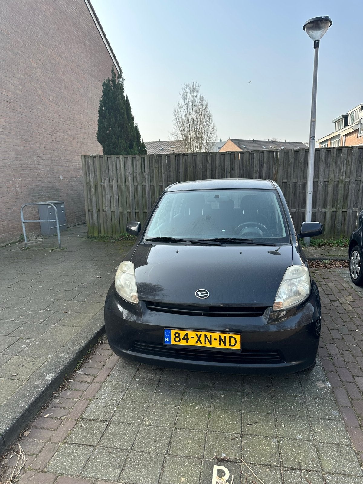 Daihatsu Sirion 1.0 51KW 2007 Zwart, Auto's, Daihatsu, Voorwielaandrijving, Zwart, Handgeschakeld, 3 cilinders
