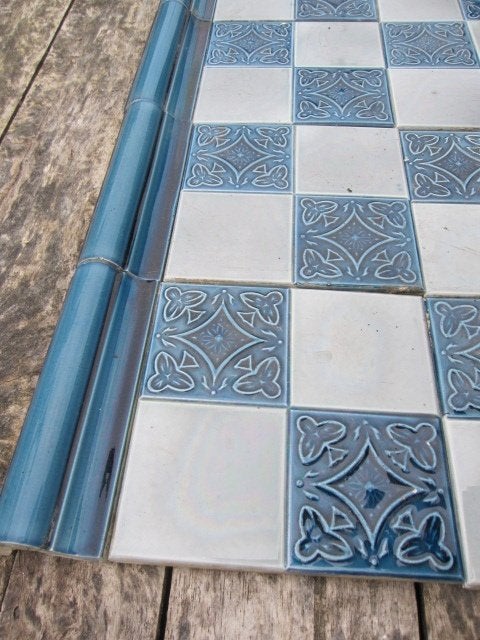 23 stuks Antieke wandtegels grijs met blauw relief 15x15cm, Ophalen