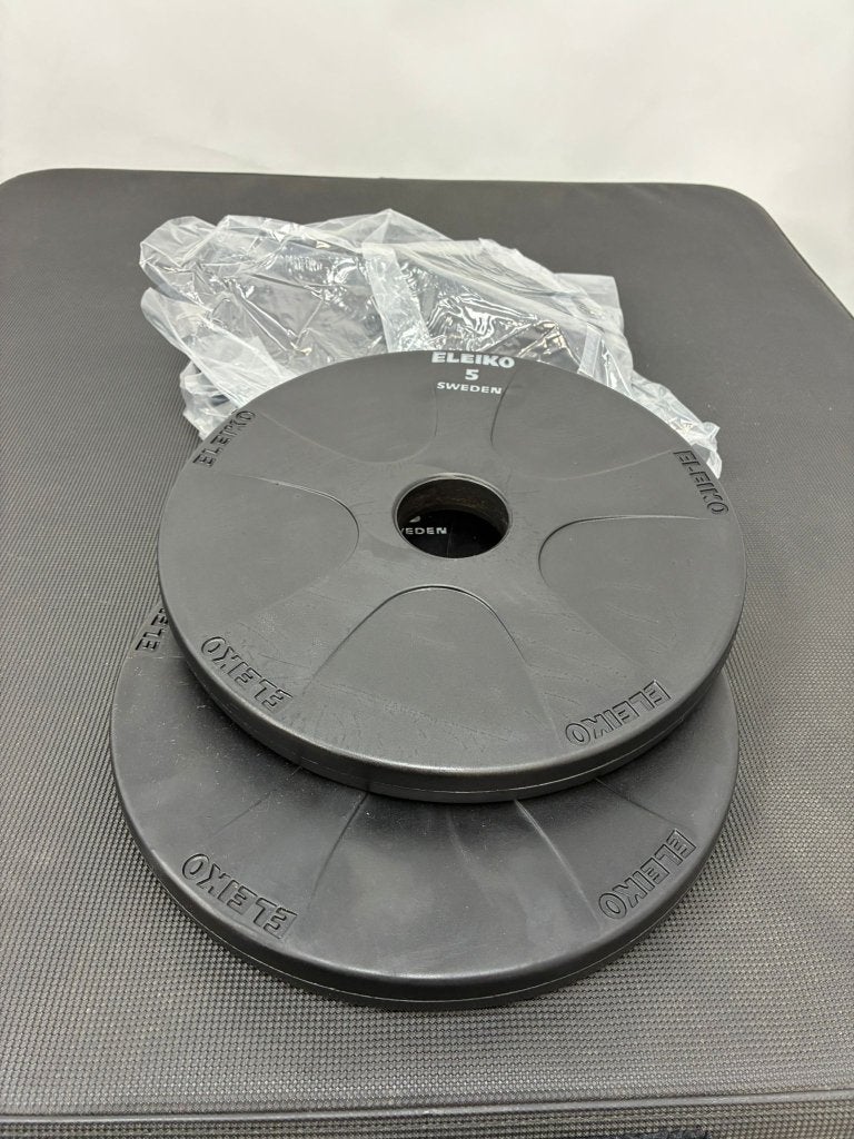 Eleiko Vulcano plates 5KG, Niet ingevuld, Zo goed als nieuw, Ophalen, Niet ingevuld