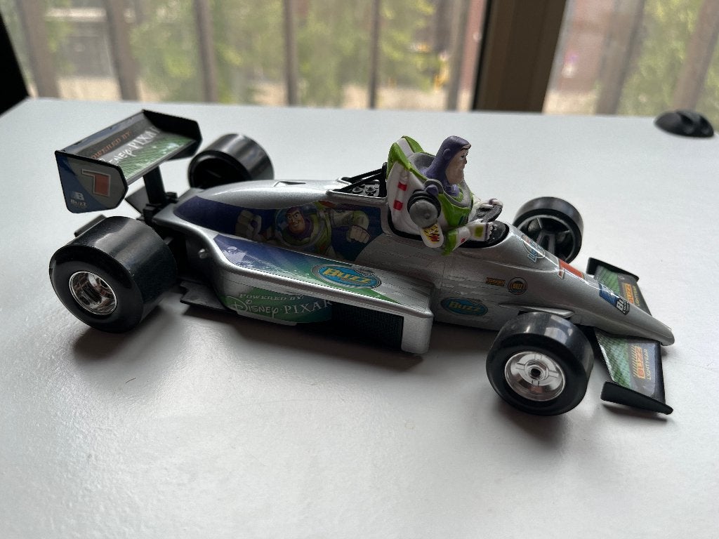 Bburago Disney Formula Toy Story Buzz Lightyear F1 auto, Ophalen of Verzenden, Overige figuren, Zo goed als nieuw, Beeldje of Figuurtje