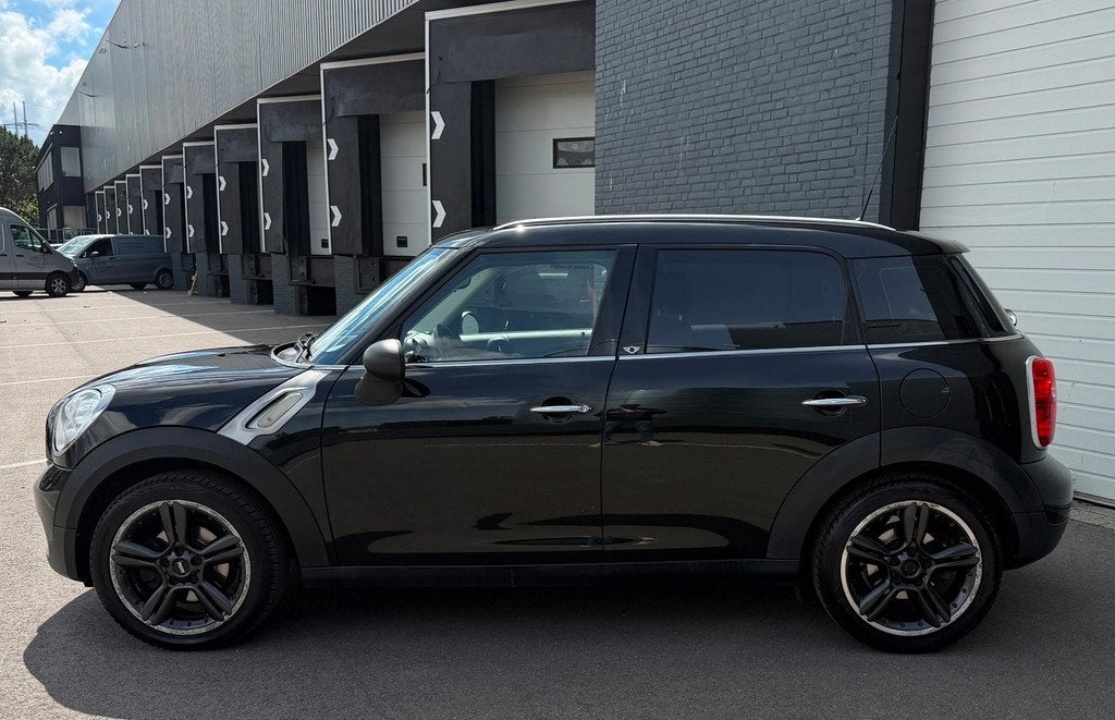 Mini Countryman 1.6 One LEDER/HARMAN/KARDON/CRUISE/S-VELGEN, Auto's, Mini, Voorwielaandrijving, Euro 5, Gebruikt, Zwart