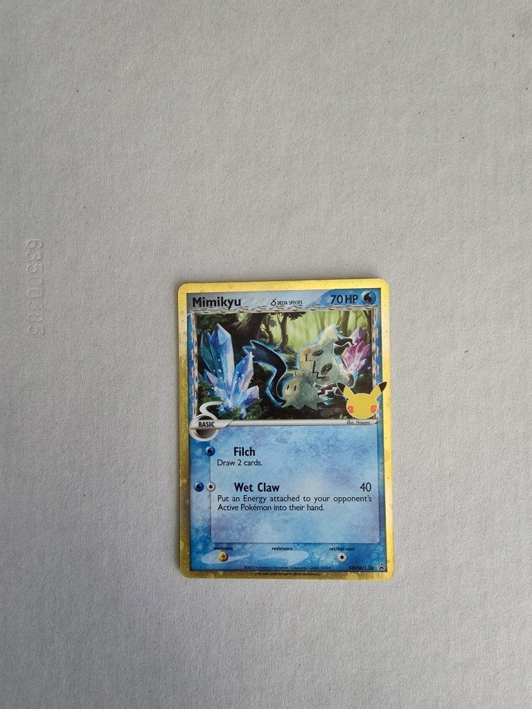 Mimikyu SWSH136 Celebrations Pokémon Kaart, Ophalen of Verzenden, Zo goed als nieuw, Losse kaart