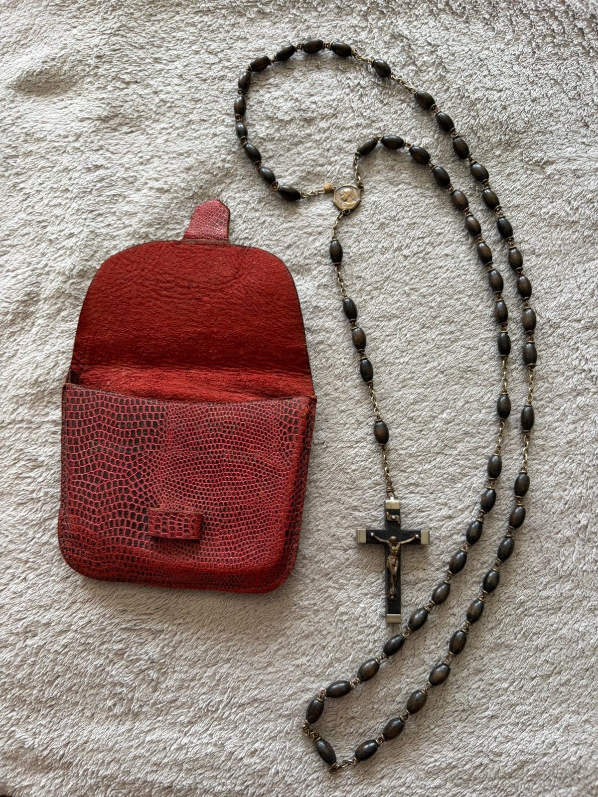 Paternoster in etui, Ophalen