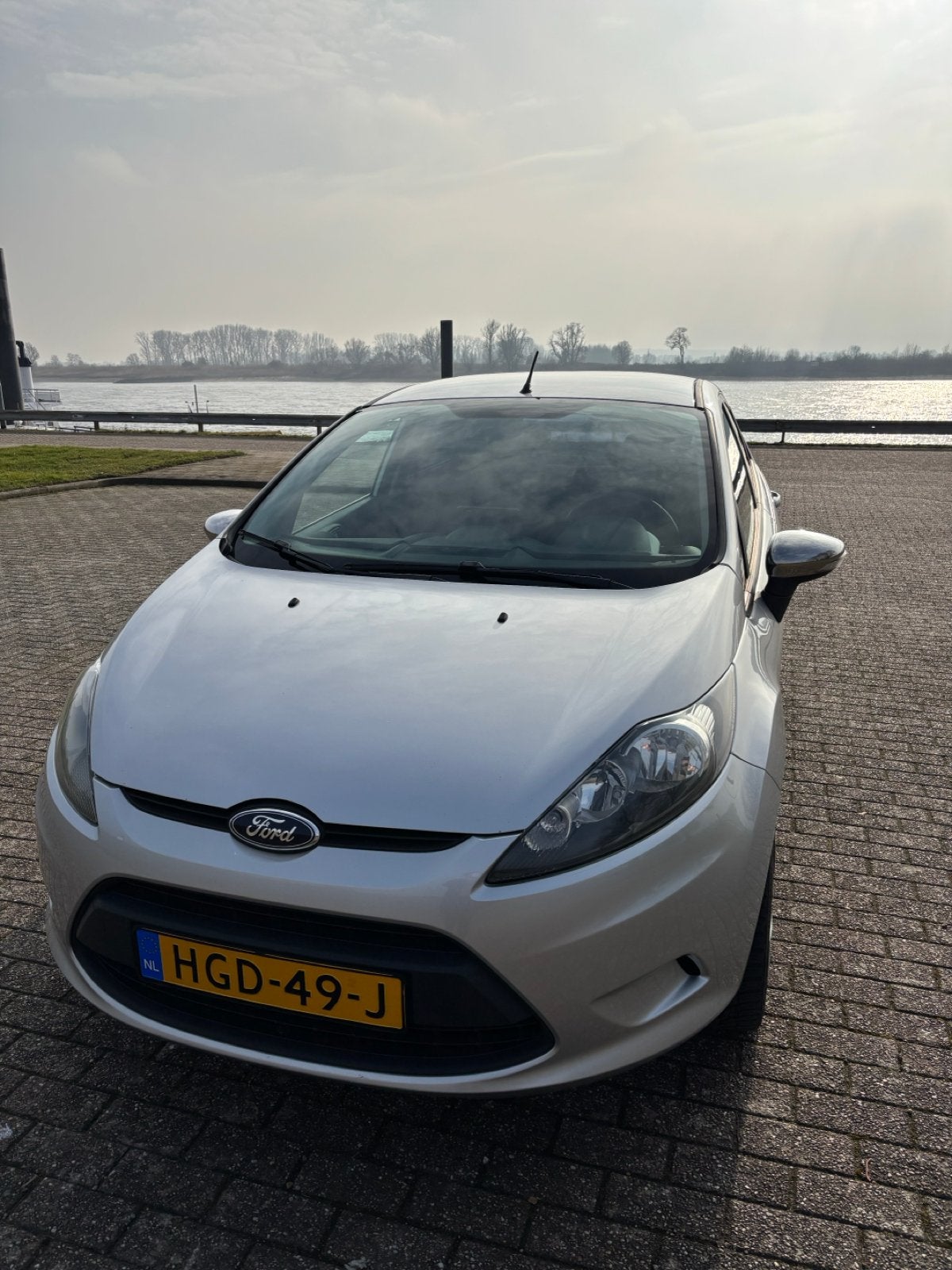 Ford Fiësta 1.25 60KW 5DR 2012 Grijs, Auto's, Voorwielaandrijving, Stof, 4 cilinders, Handgeschakeld