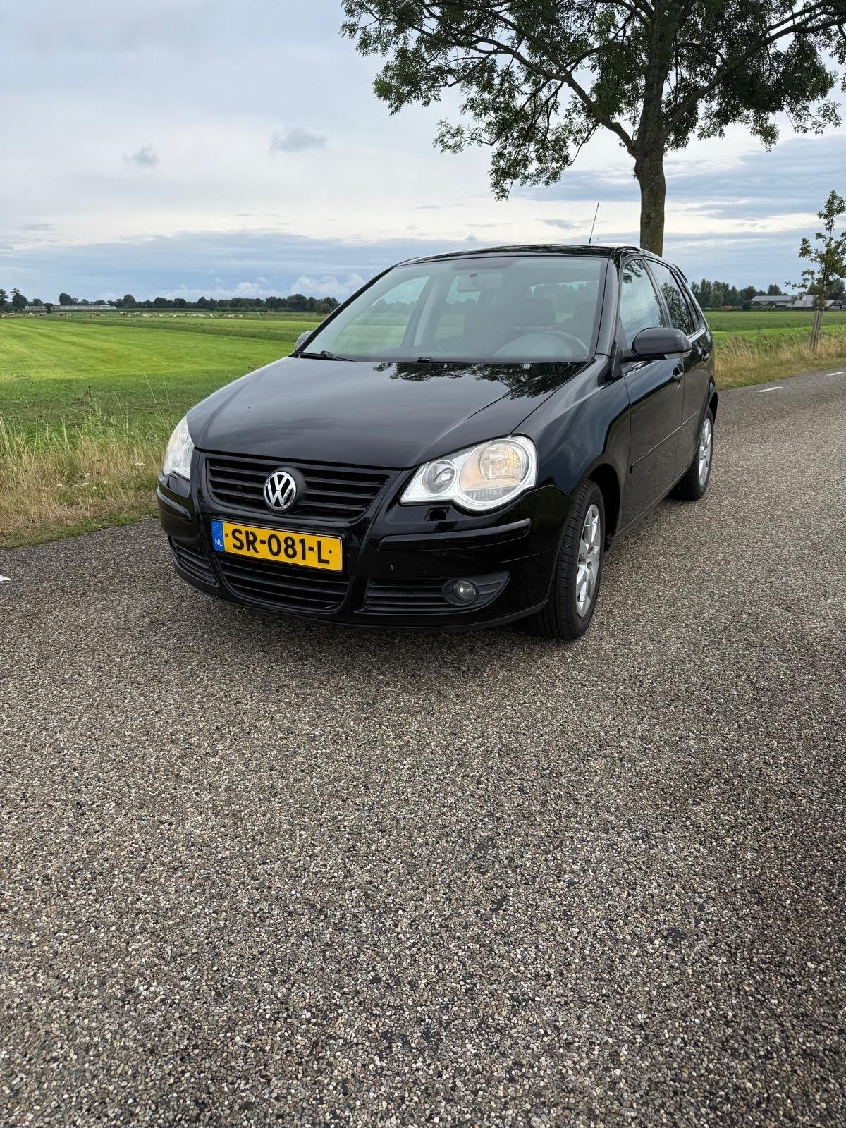 Volkswagen Polo 1.2 44KW 2009 Zwart, Voorwielaandrijving, Stof, 40 €/maand, 989 kg