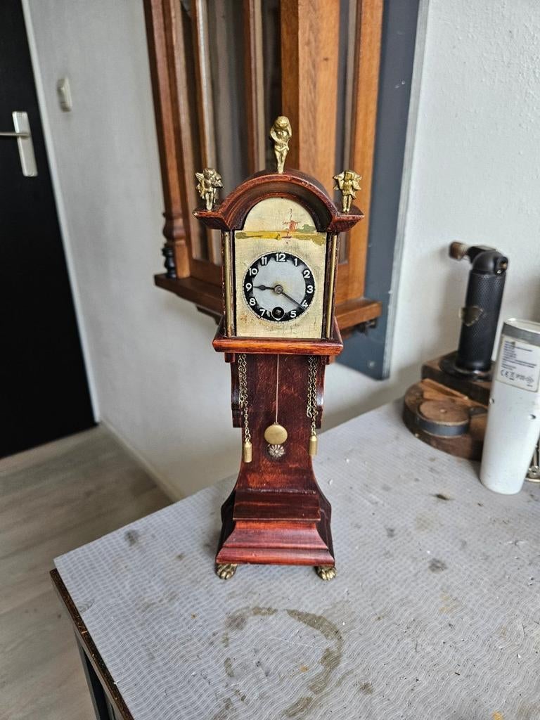 Antieke staande klokje, Antiek en Kunst, Antiek | Klokken, Ophalen of Verzenden