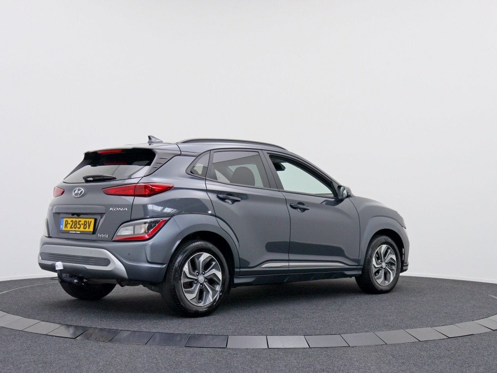 Hyundai KONA 1.6 GDI HEV Fashion | Navigatie | Trekhaak, Auto's, Stof, Gebruikt, Origineel Nederlands, 26 km/l