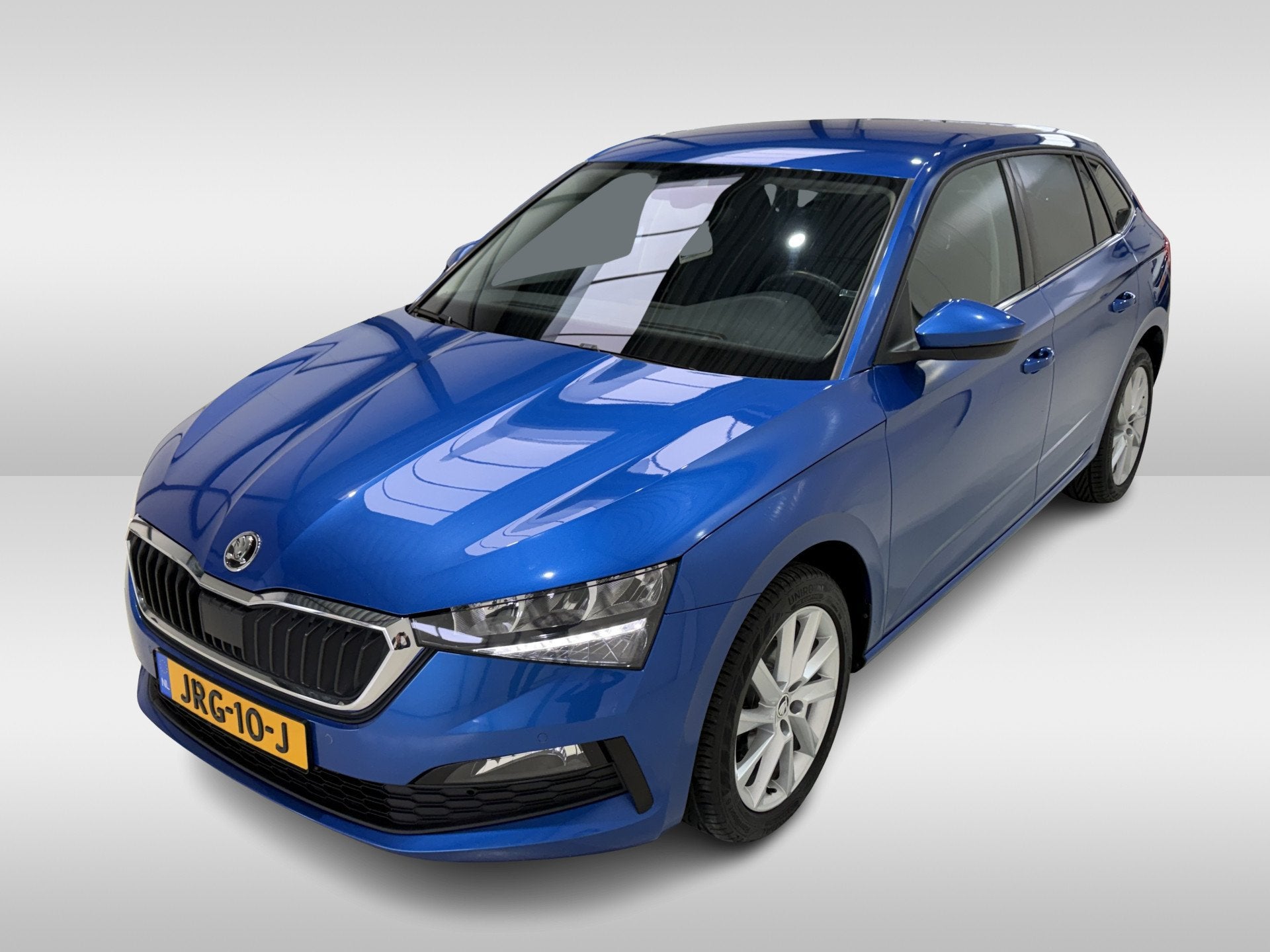 Skoda Scala 1.0 TSI 110pk DSG Ambition (bj 2021, automaat), Auto's, Dealer onderhouden, Gebruikt, Blauw, Origineel Nederlands