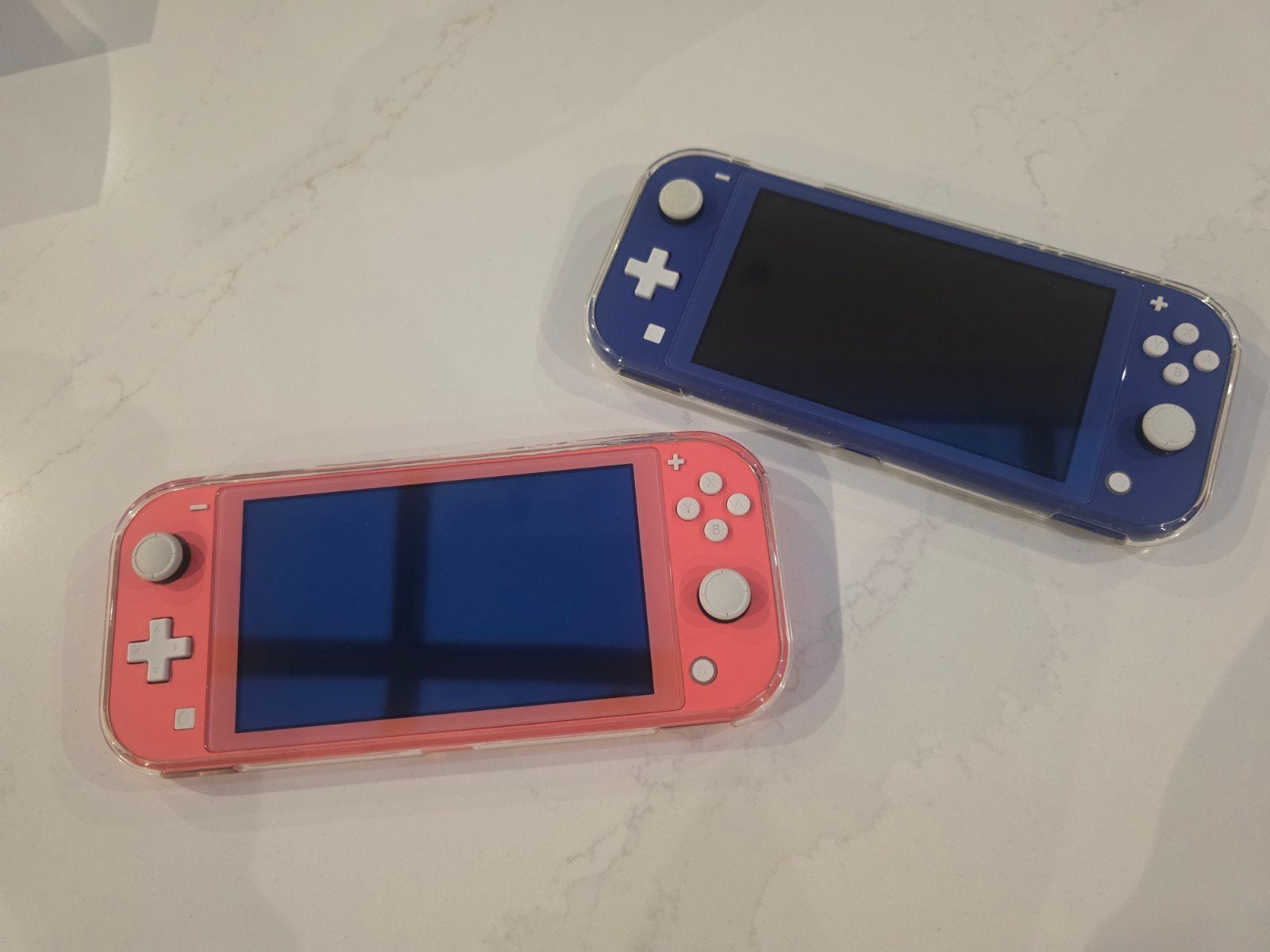 Nintendo Switch Lite: Roze & donker blauw, Ophalen of Verzenden, Roze of Coral, Zo goed als nieuw