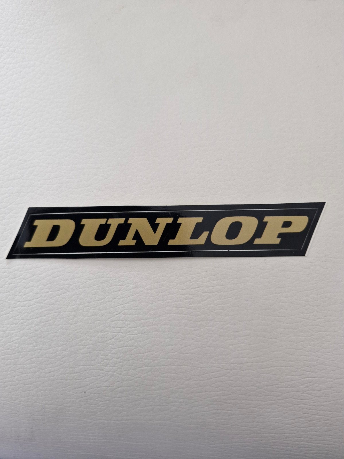 10074 Dunlop sticker - Zwart met goudkleurige letters, Ophalen of Verzenden, Nieuw, Merk