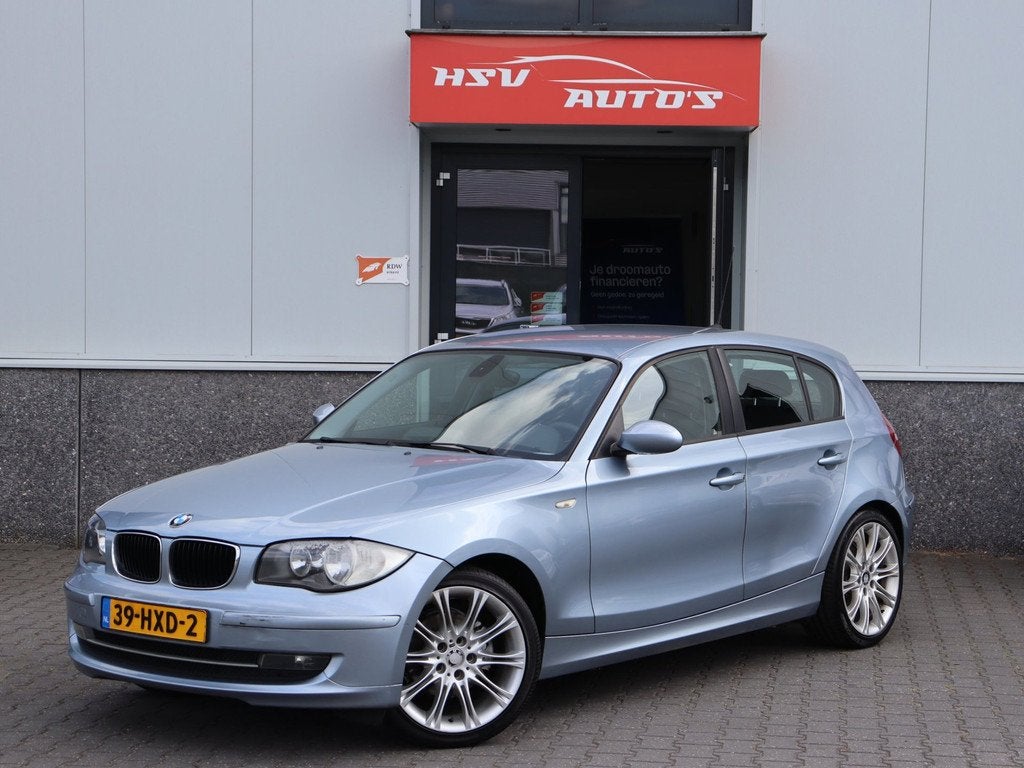 BMW 1-serie 118i Business Line navi LM 4-deurs org NL, Auto's, BMW, 1-Serie, Achterwielaandrijving, Blauw, Origineel Nederlands