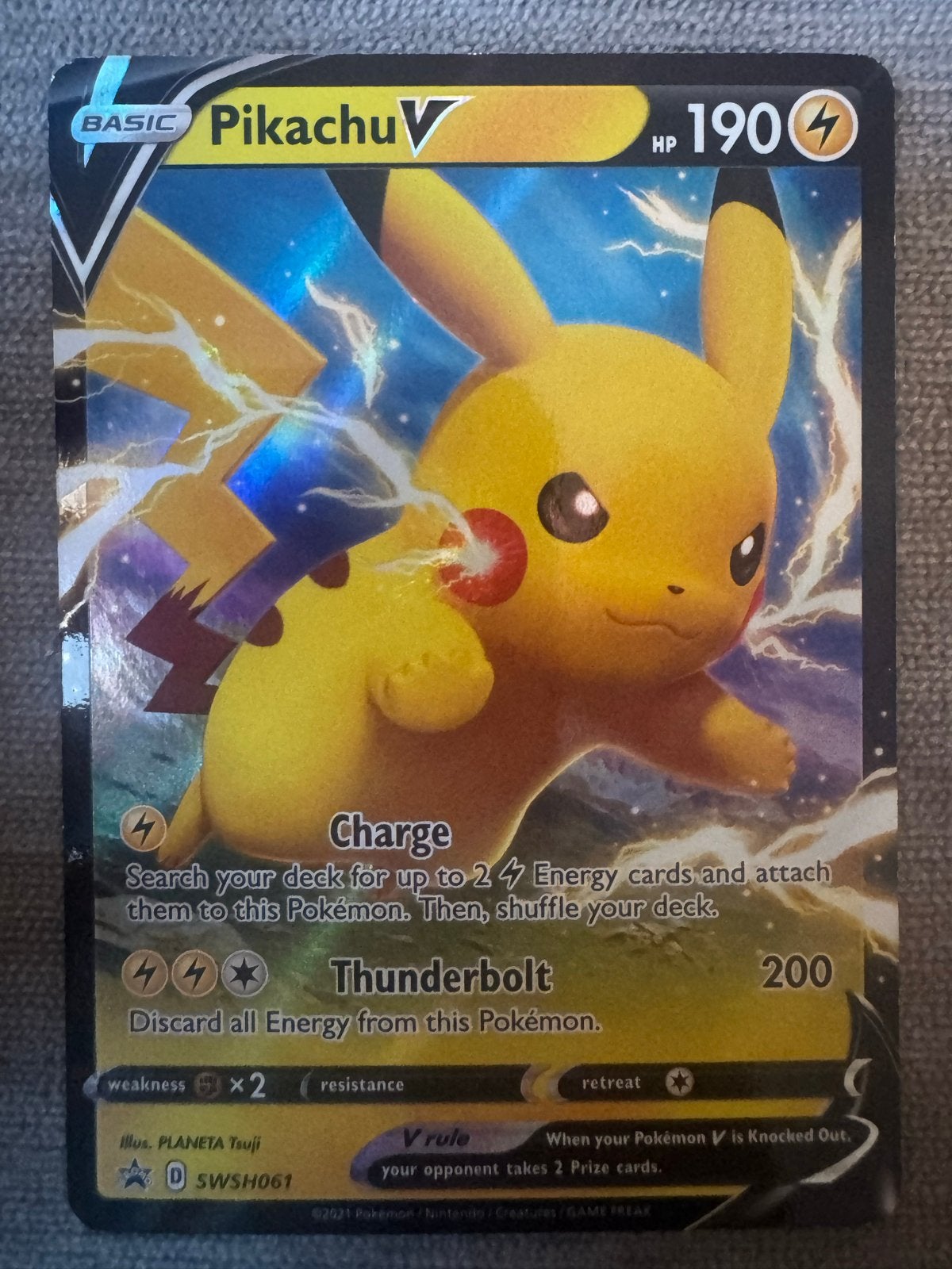 Pikachu V SWSH061 Pokémon Kaart - Zo goed als nieuw, Ophalen of Verzenden, Zo goed als nieuw, Losse kaart