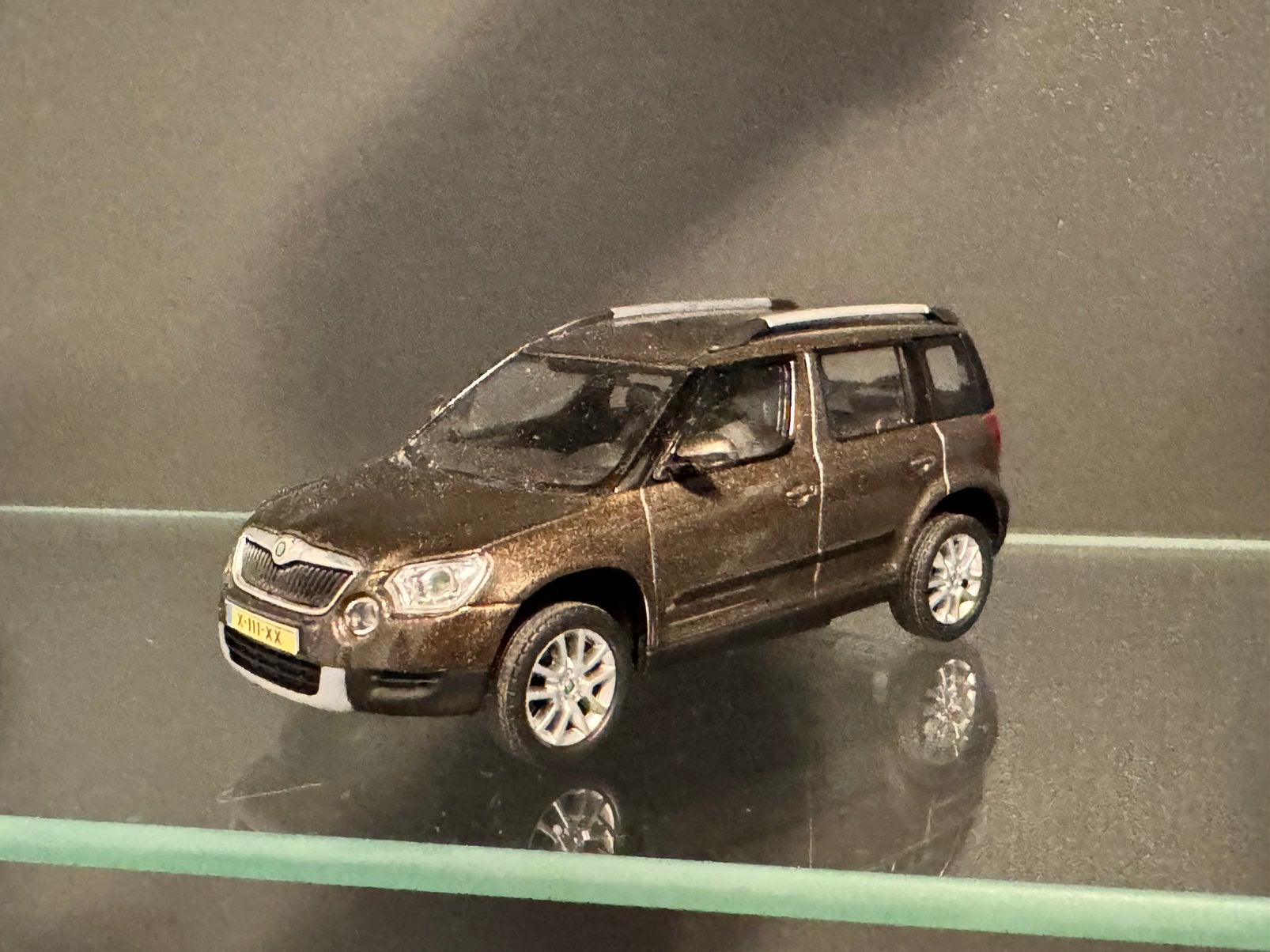 Skoda Yeti 2011 Bruin Metallic Abrex 1:43, Ophalen of Verzenden, Zo goed als nieuw, Auto, Overige merken