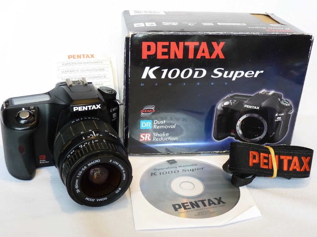 Pentax K100 D Super body, Sigma Zoom AF 28-80, met doos, Spiegelreflex, 6 Megapixel, Ophalen of Verzenden, Zo goed als nieuw