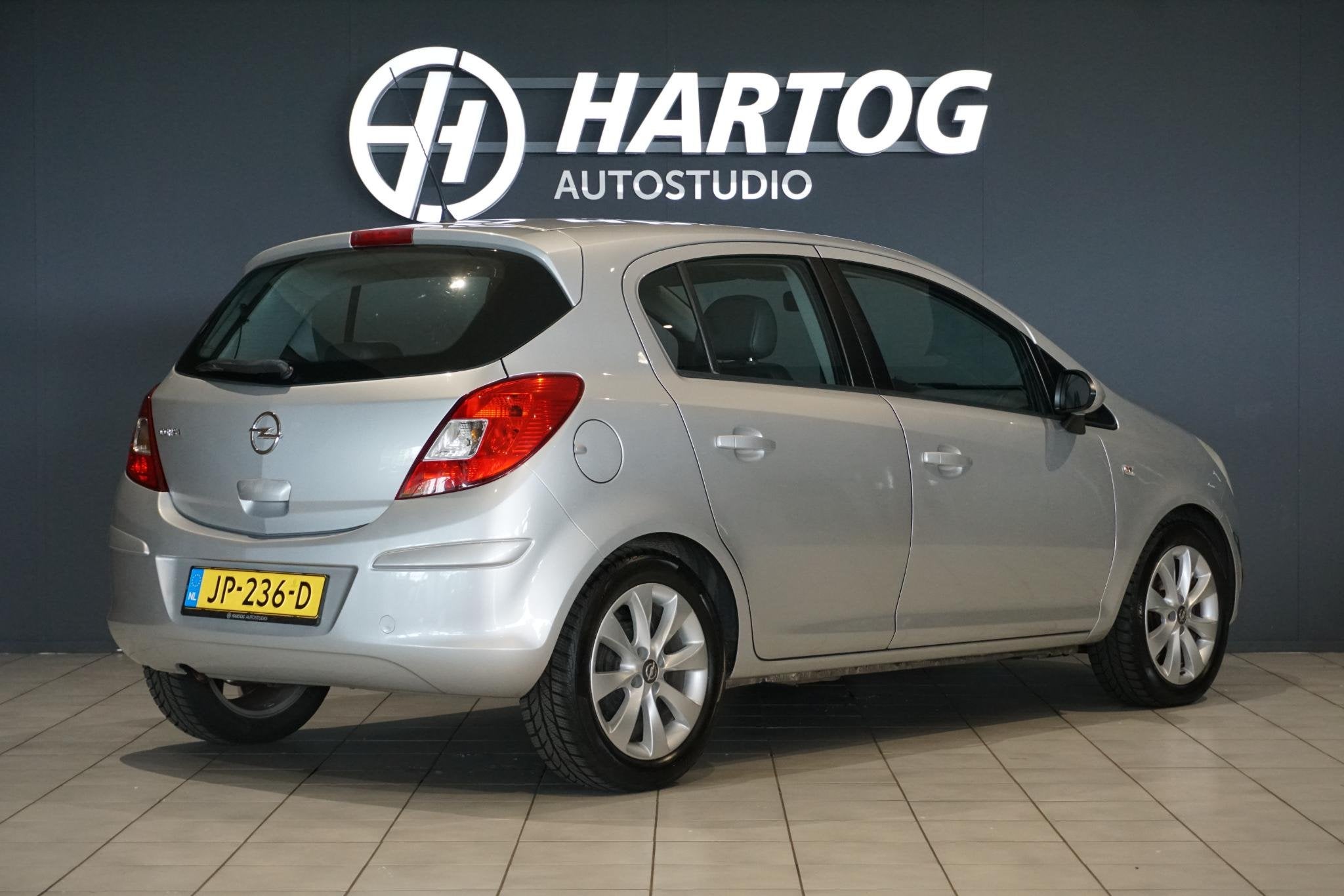 Opel Corsa 1.4-16V Anniversary Edition + CRUISE CONTROL / BL, Auto's, Voorwielaandrijving, Euro 5, Gebruikt, 4 cilinders