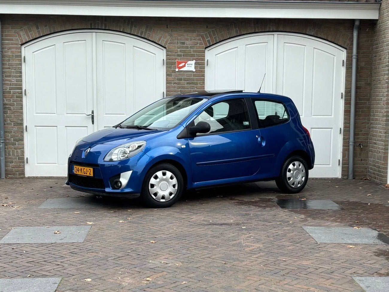 Renault Twingo 1.2 Dynamique Panorama dak (bj 2009), Auto's, Voorwielaandrijving, Gebruikt, 31 €/maand, 4 cilinders