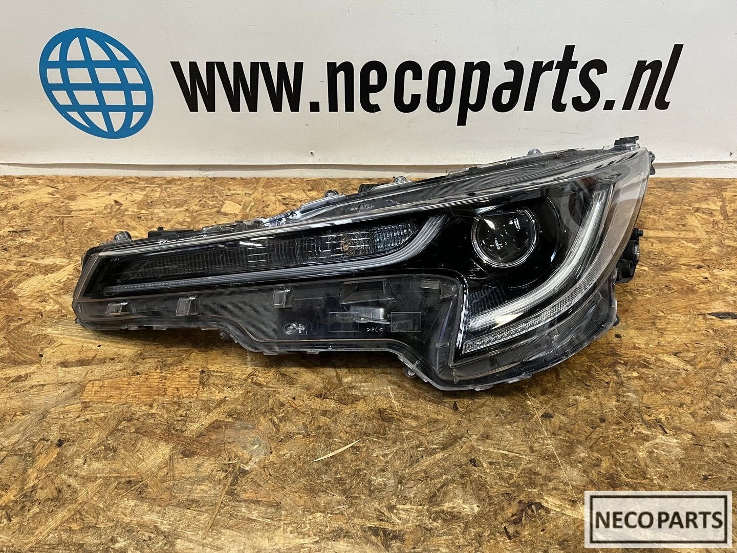 TOYOTA COROLLA ESTATE KOPLAMP LINKS 81150-02S70 ORGINEEL, Auto-onderdelen, Verlichting, Gebruikt, -, -, Ophalen of Verzenden