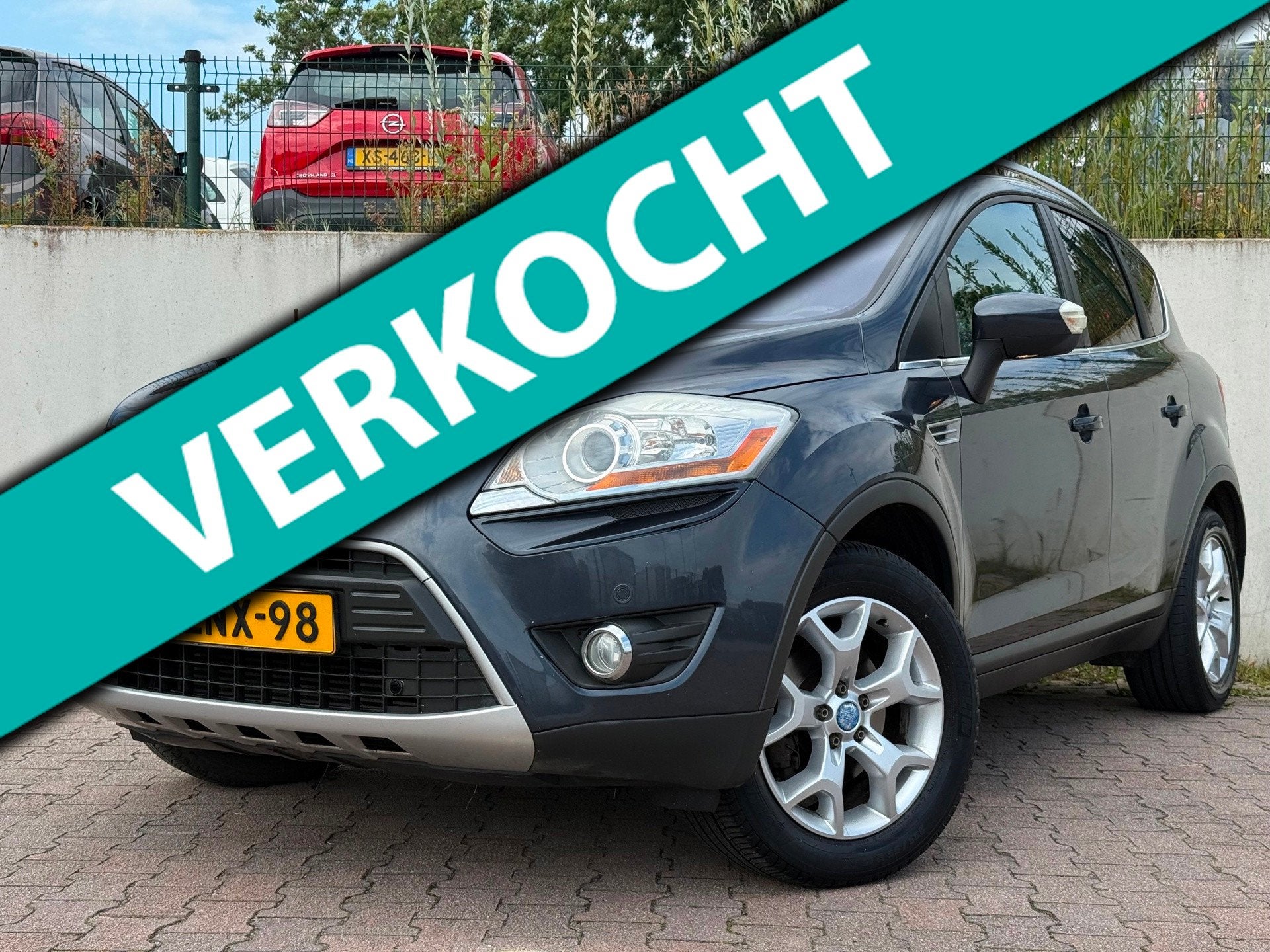 Ford Kuga 2.5 20V Titanium/LPG/PANO/LEDER/NAVI/PDC V+A/DISTR, Auto's, Ford, Gebruikt, Zwart, Automatische klimaatregeling, 2521 cc