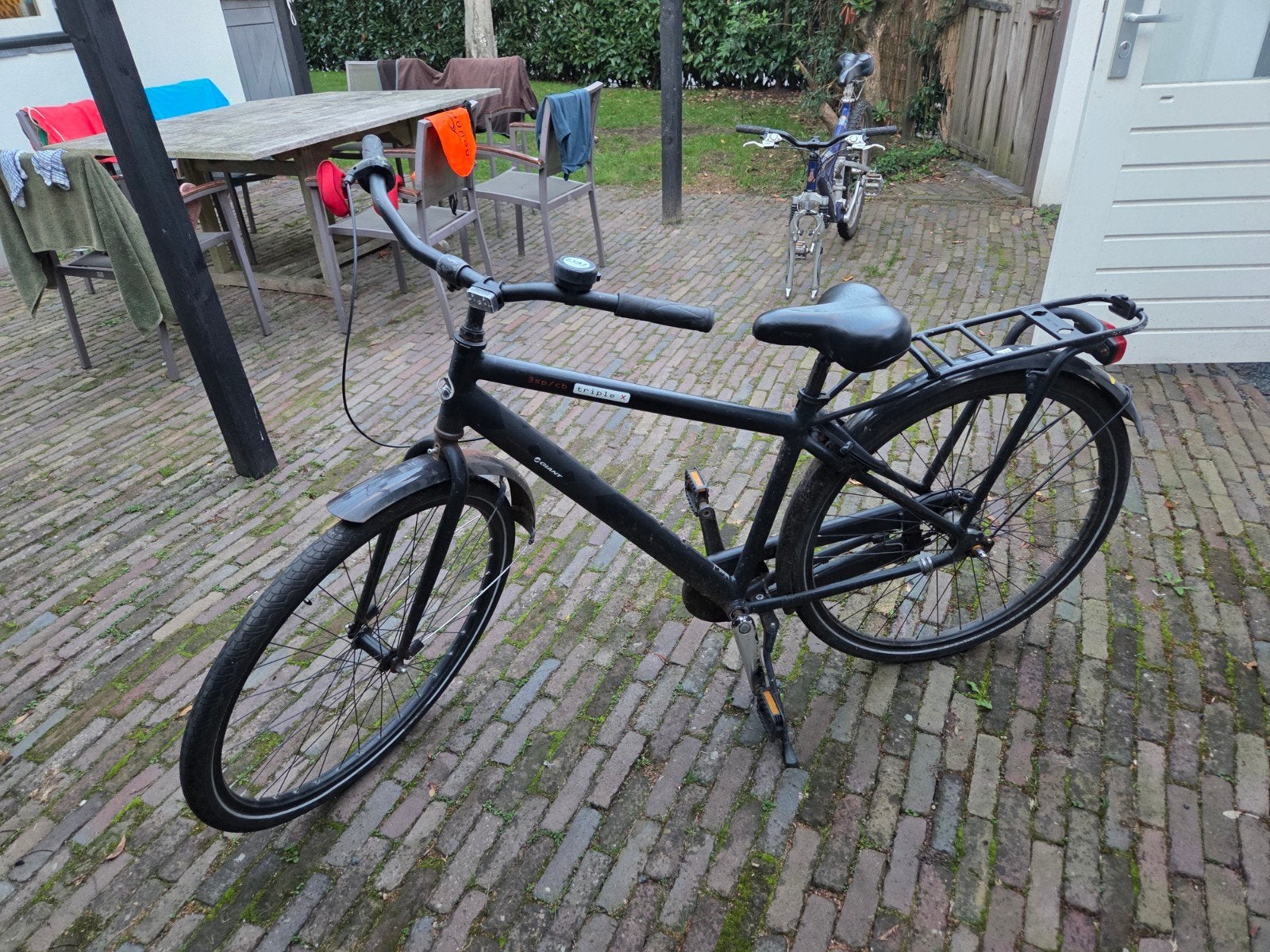 Giant triple x jongensfiets, zwart, 28 inch wielen., Fietsen en Brommers, Ophalen, Terugtraprem, Gebruikt, Giant