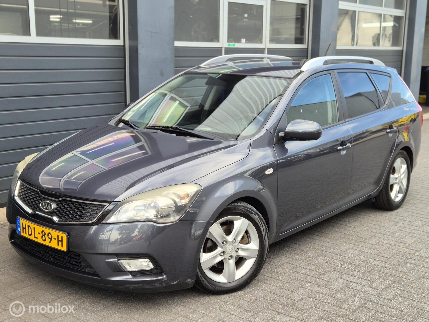 Kia cee'd Sporty Wagon 1.4 CVVT X-executive | CAMERA | PDC |, Auto's, Voorwielaandrijving, Euro 5, Gebruikt, 4 cilinders