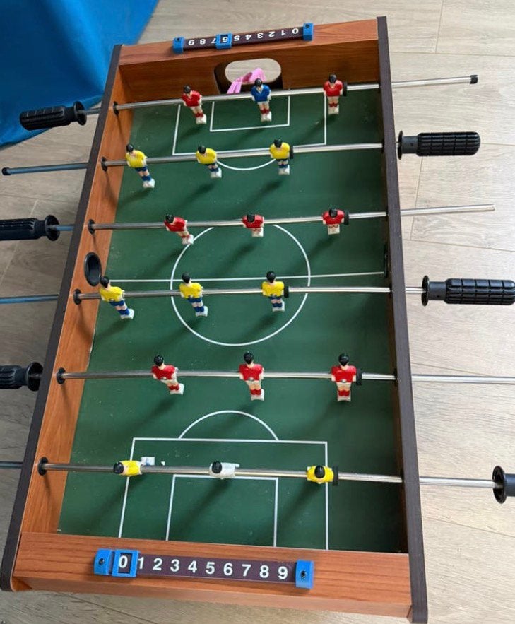 Tafelvoetbal, Ophalen