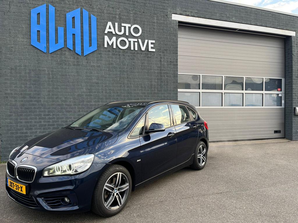 BMW 2-Serie Active Tourer 220i 192pk Aut 2015 Blauw, Auto's, BMW, 1998 cc, 730 kg, Blauw, Bedrijf