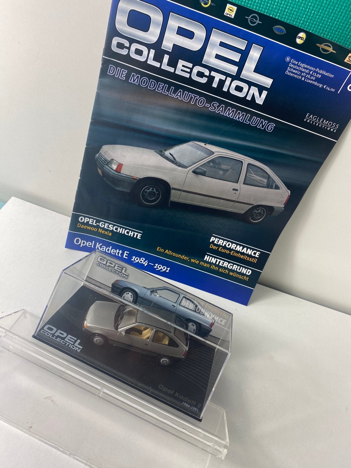 1:43 Opel KADETT E met magazine-excellent, Ophalen of Verzenden, Nieuw, Auto, Overige merken
