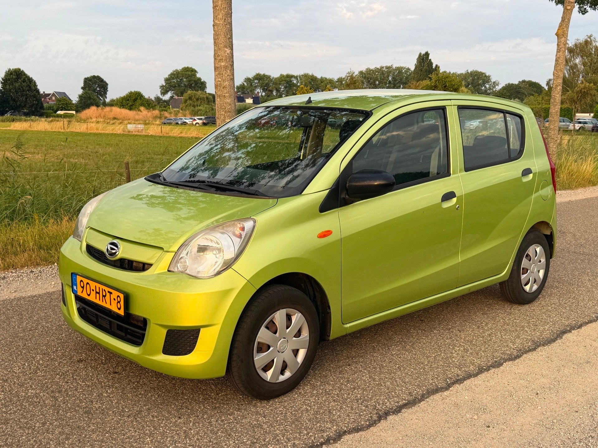 Daihatsu Cuore 1.0 Trend APK 02-2027 Airco NAP, Voorwielaandrijving, Stof, Zwart, 18 €/maand