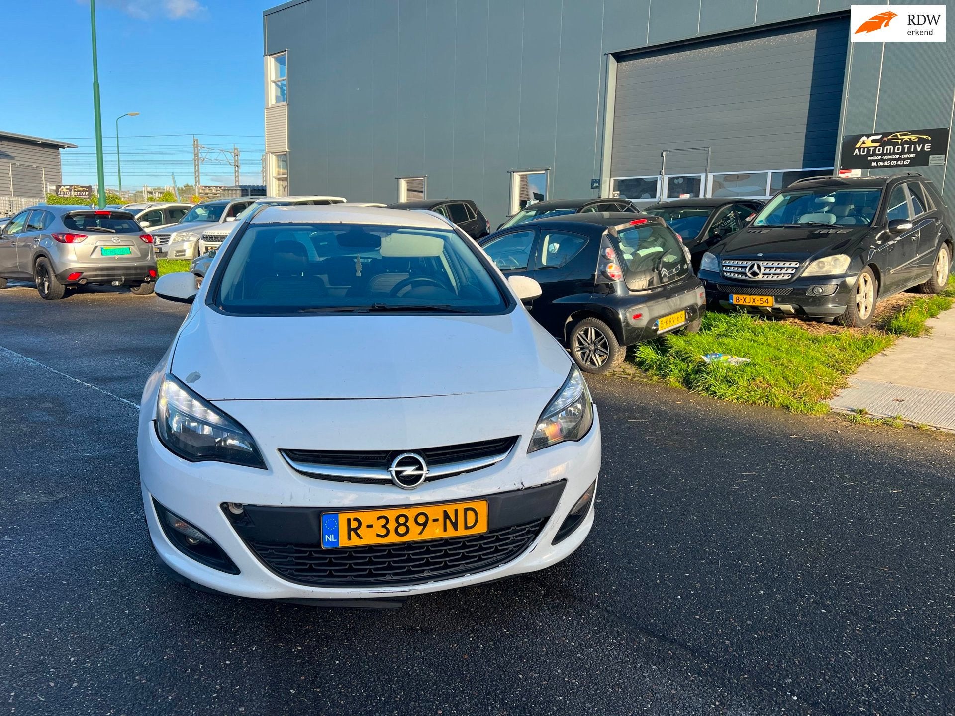 Opel Astra Sports Tourer 2.0 CDTi Cosmo automaat., Auto's, Euro 5, 4 cilinders, Wit, Verwarmde buitenspiegels