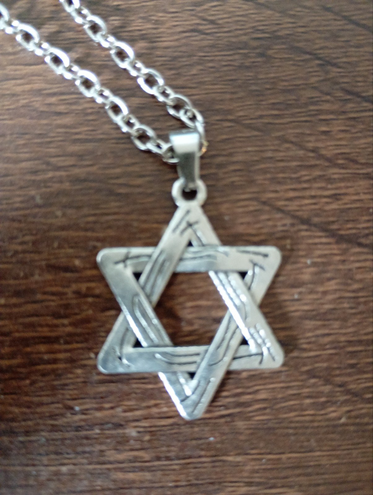 Zilverkleurige davidster plus ketting nieuw, Ophalen of Verzenden, Nieuw, Zilver, Overige materialen