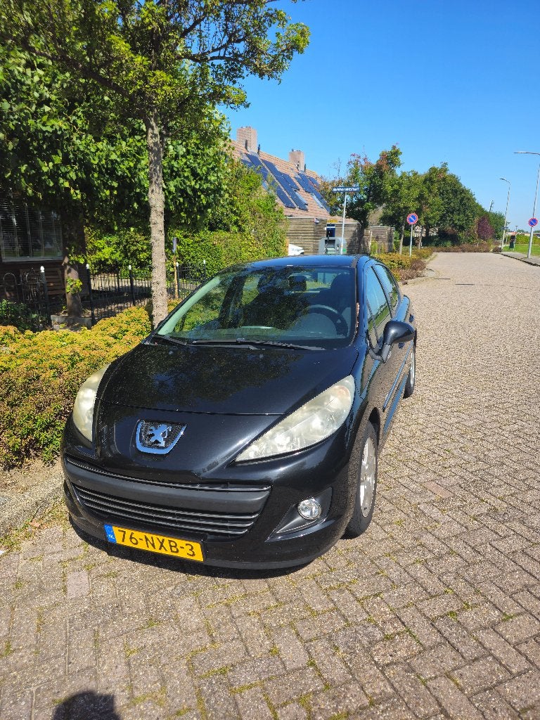 Peugeot 207 1.4 VTI Millesim 5DRS 2011 Zwart, Auto's, Voorwielaandrijving, Stof, 1064 kg, Origineel Nederlands